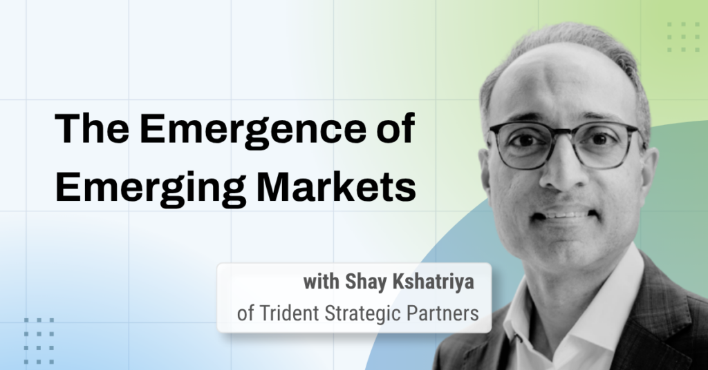 romotional graphic for a financial commentary titled "The Emergence of Emerging Markets," featuring Shay Kshatriya of Trident Strategic Partners. A black-and-white headshot of a man wearing glasses is set against a light blue and green gradient background.